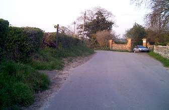 Road towards Landford Manor. Graveyard on Left.